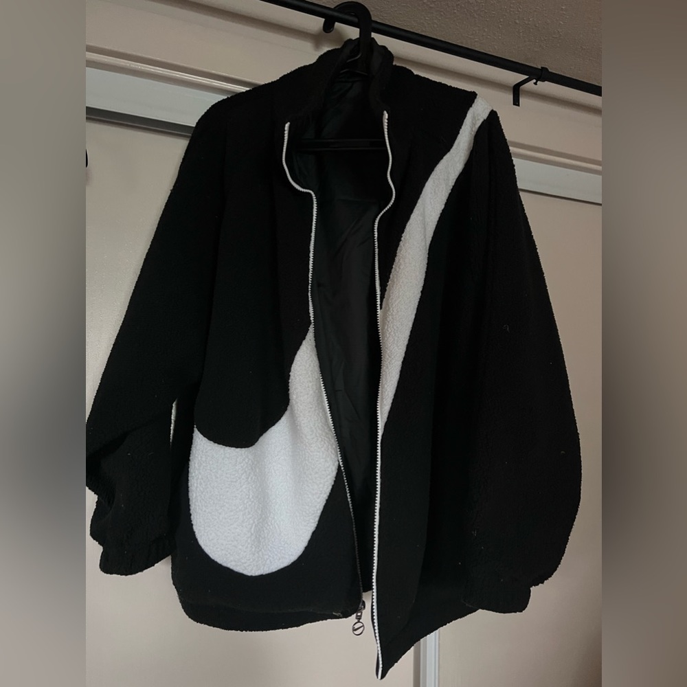 Nike Swoosh reversible fleece/windbreaker coat.